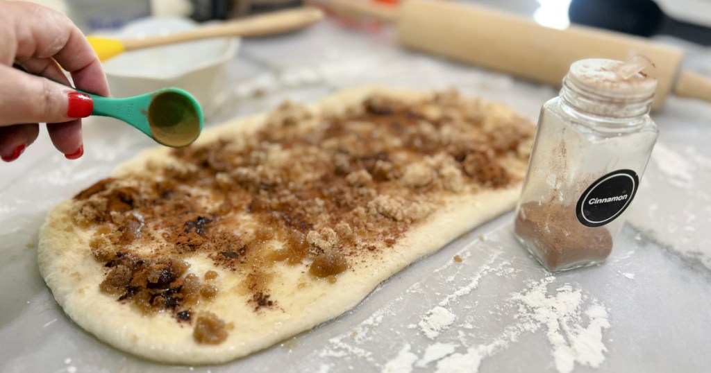 adding ground cinnamon to easy cinnamon rolls