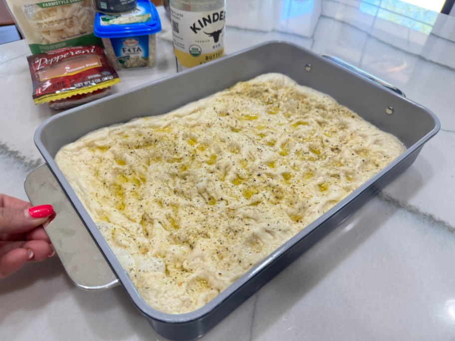 making focaccia bread with olive oil using rhodes rolls