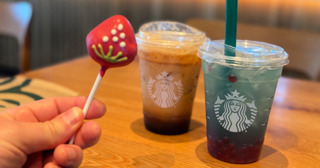 New Starbucks cake pop, and summer drinks on wooden countertop