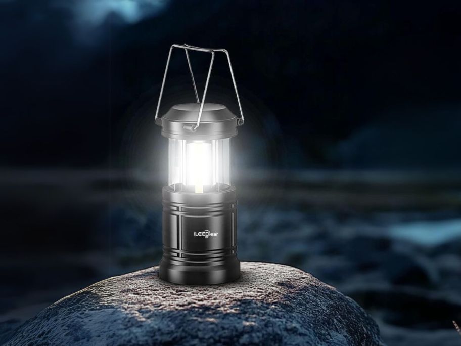 camping lantern on rock